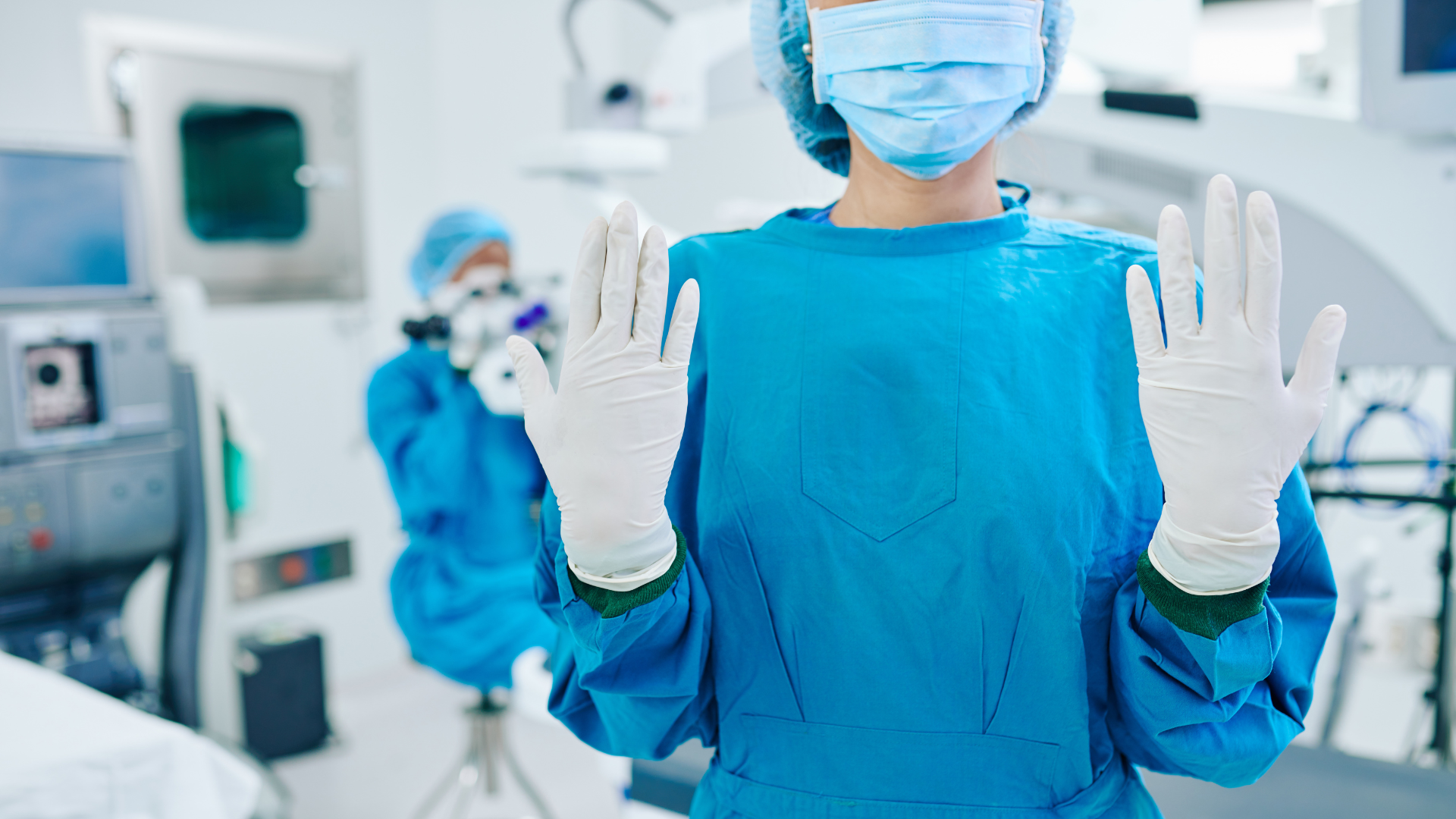 Surgeon in rubber gloves