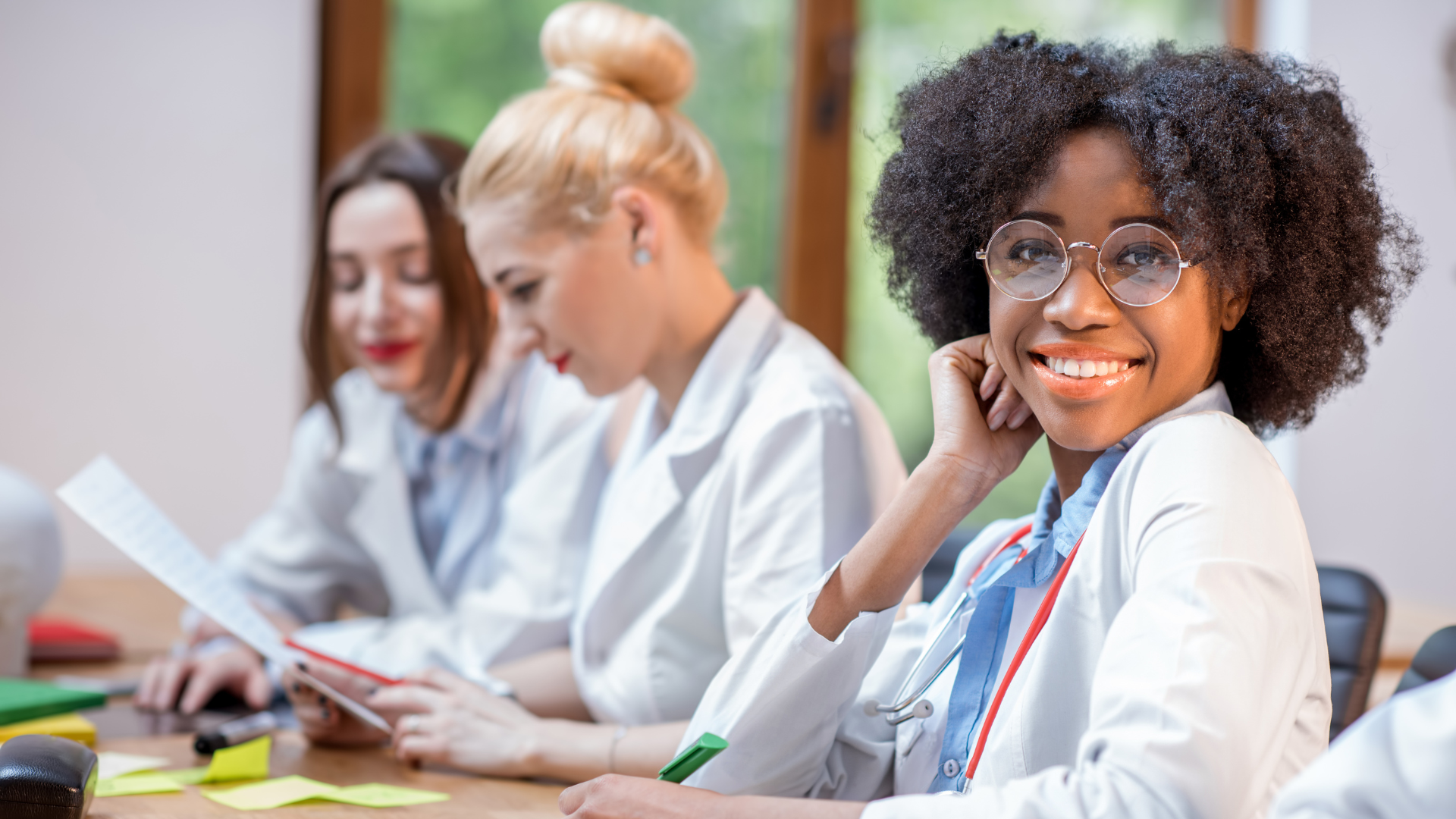 Three young women physicians