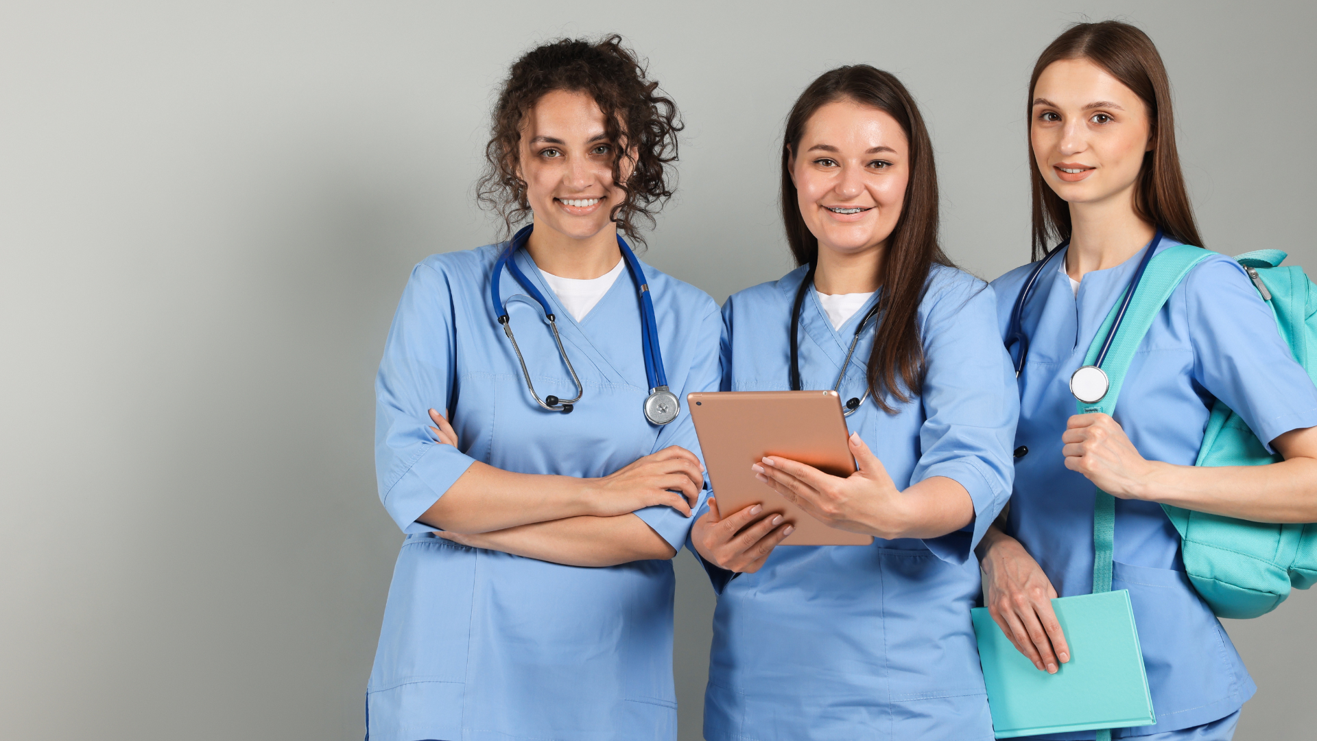Opening pathways in cardiology. Three young women in medical scrubs.