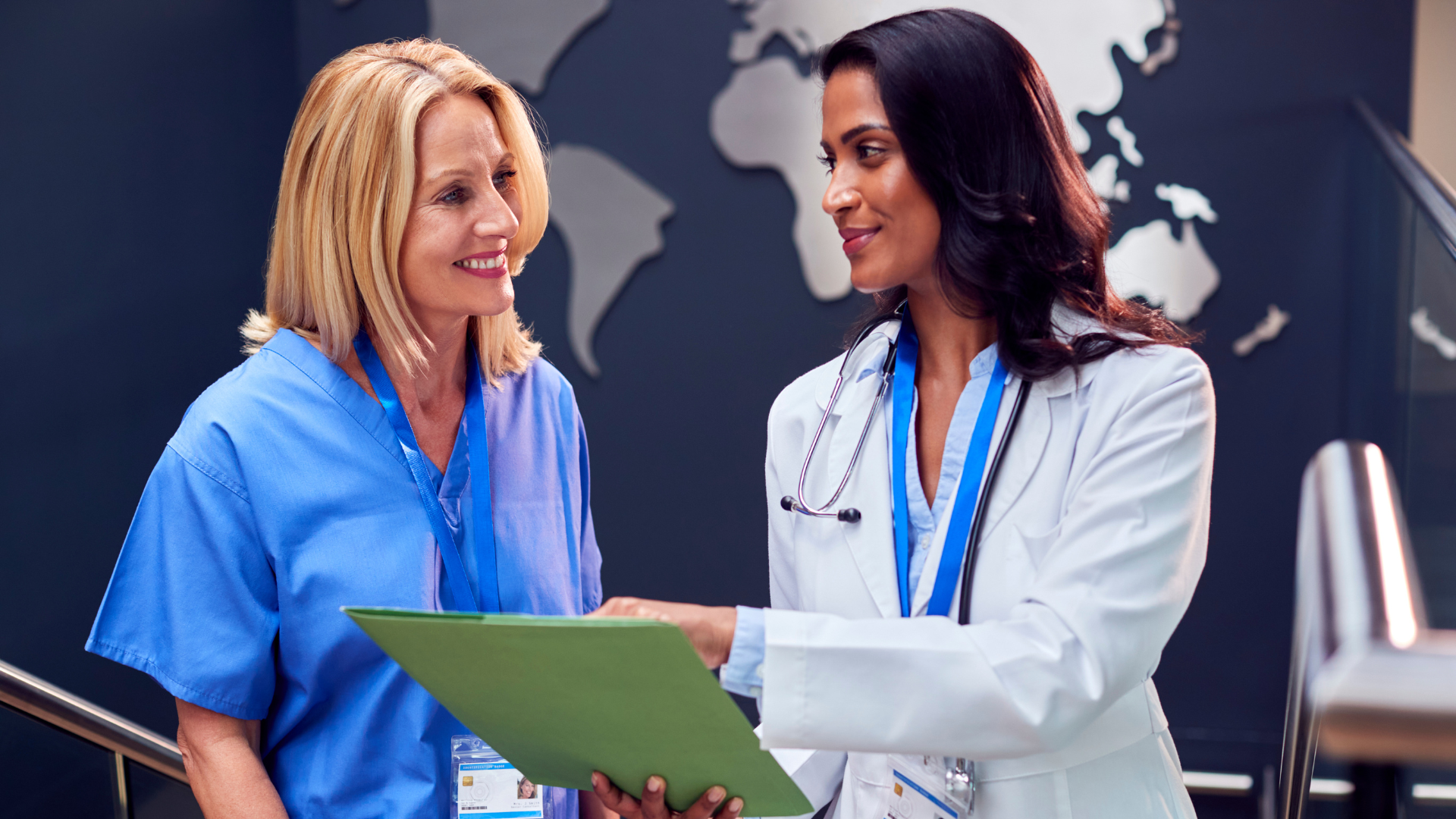 2025 Mentorship Awards 8 Two women physicians discussing patient notes